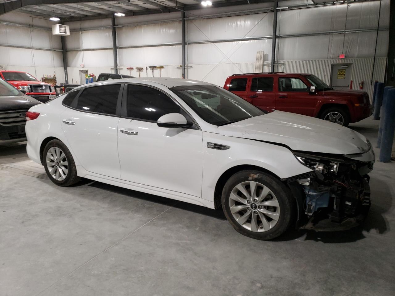 2018 KIA Optima VIN 5XXGT4L34JG264065 Copart auction photo, front end / hail damage thumbnail 4
