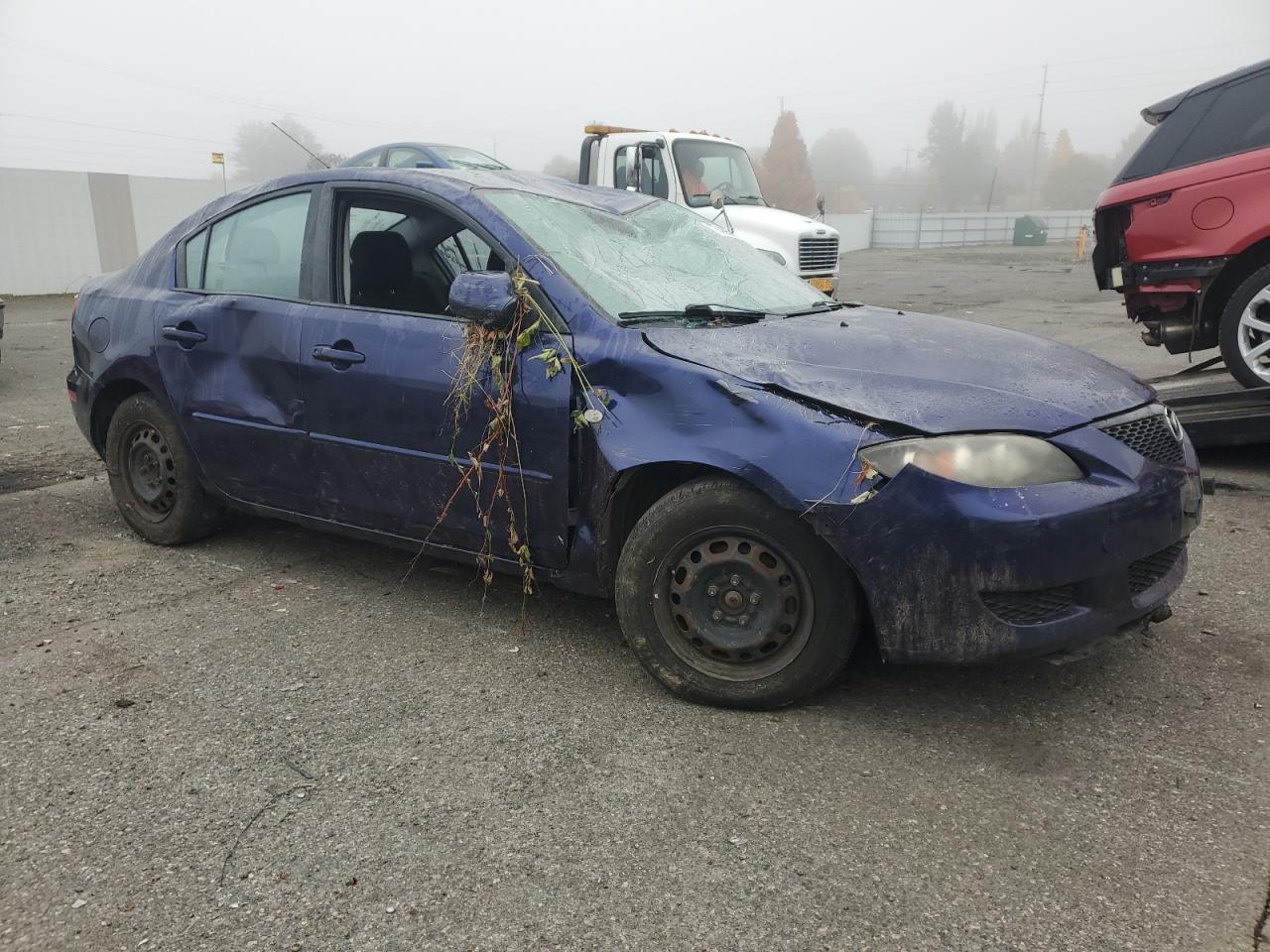 2006 Mazda 3 VIN JM1BK12F361461660 Copart auction photo, undercarriage / all over damage thumbnail 4