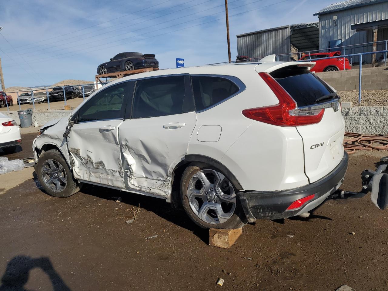 2019 Honda CR-V VIN 5J6RW2H52KA012630 Copart auction photo, side / front end damage thumbnail 2