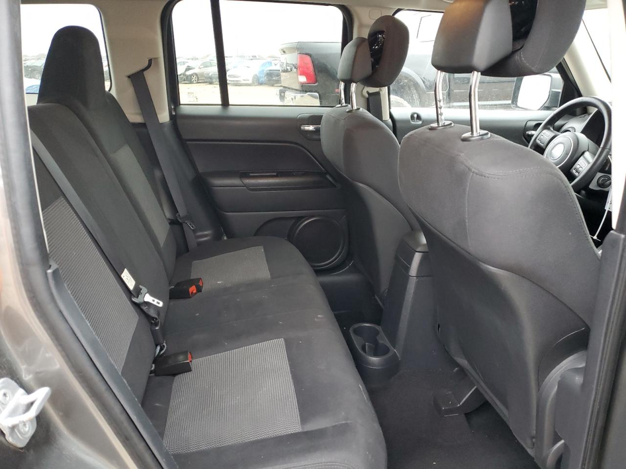 2011 Jeep Liberty (Patriot) VIN 1J4NF1GBXBD283224 Copart auction photo, rear end damage thumbnail 11