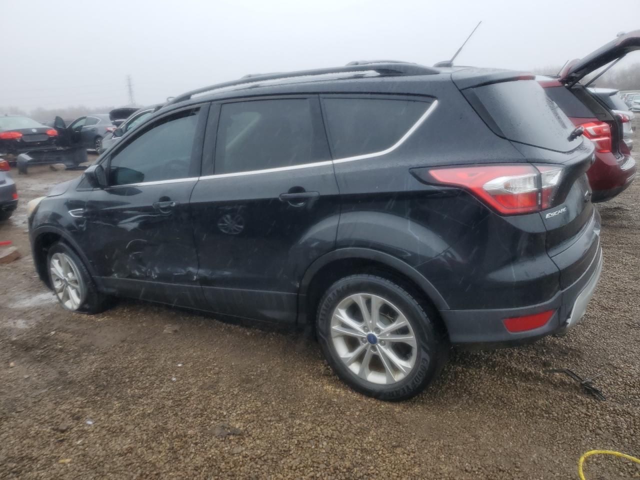 2017 Ford Escape VIN 1FMCU9G93HUB90659 Copart auction photo, side damage thumbnail 2