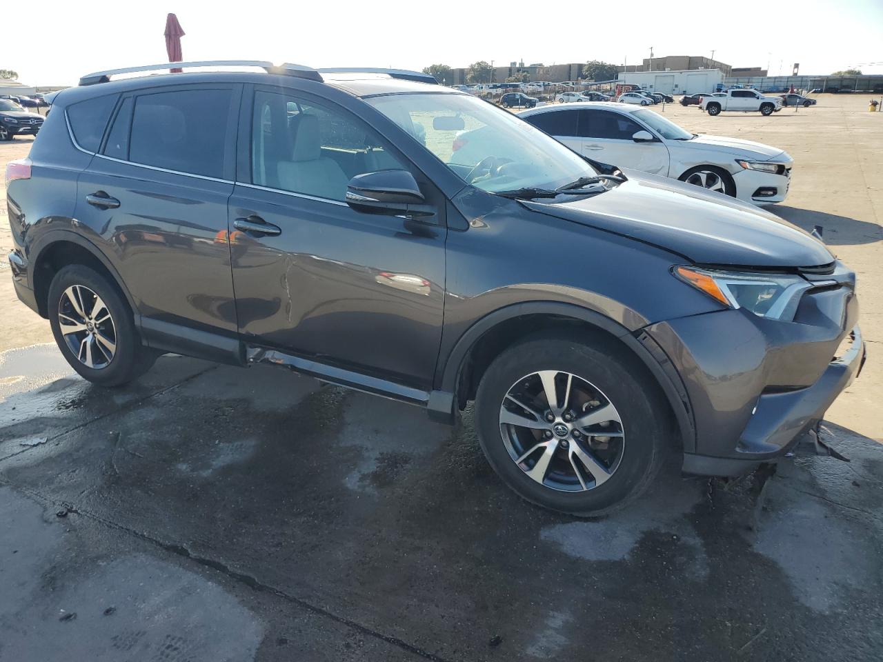 2016 Toyota RAV 4 VIN 2T3WFREV5GW271241 Copart auction photo, front end / side damage thumbnail 4