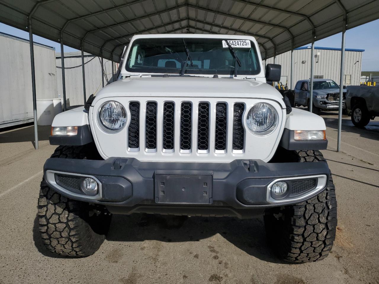 2021 Jeep Gladiator VIN 1C6HJTFG8ML511828 Copart auction photo, side damage thumbnail 5