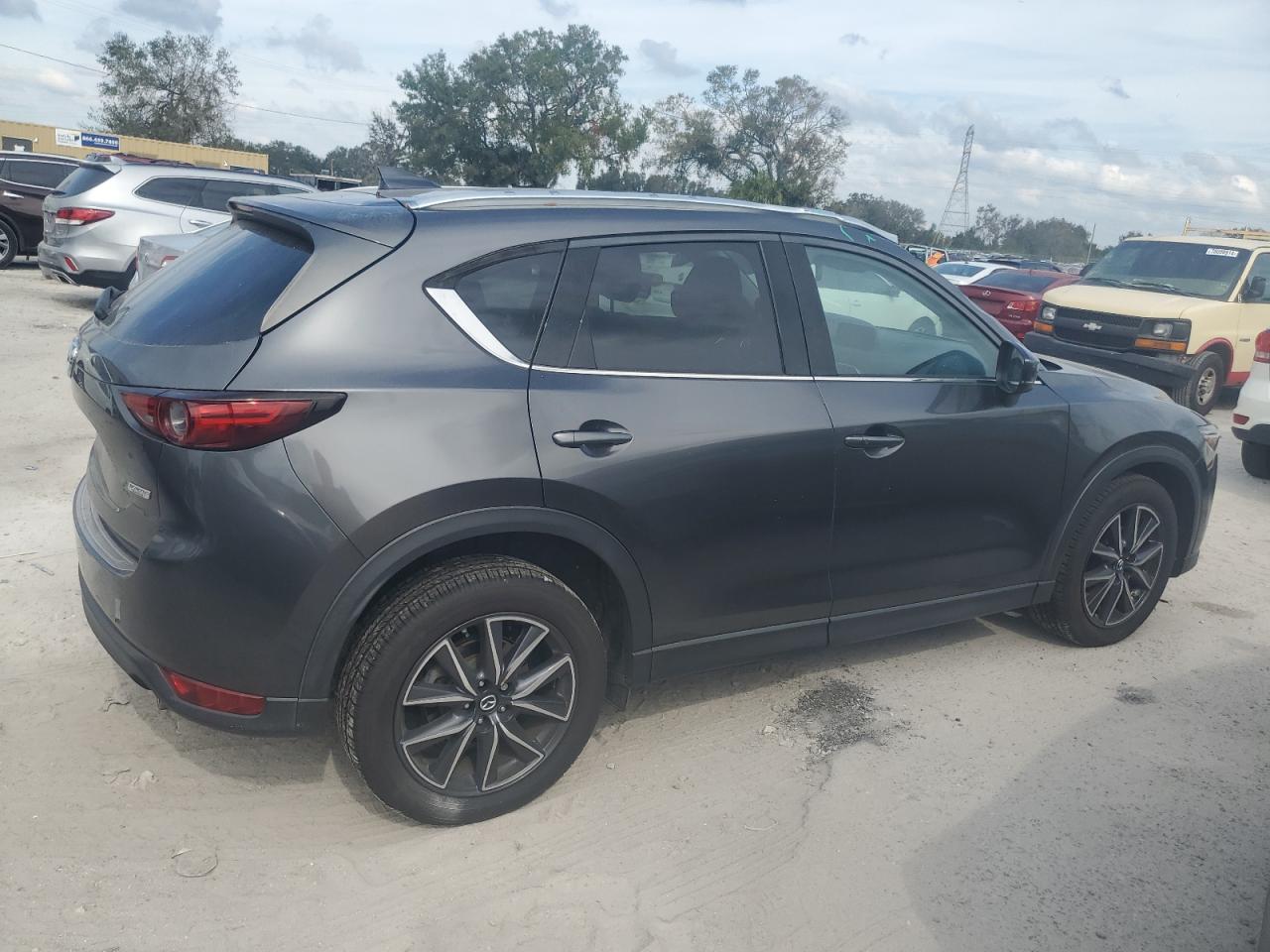 2018 Mazda CX-5 VIN JM3KFADM1J0321256 Copart auction photo, top/roof damage thumbnail 3