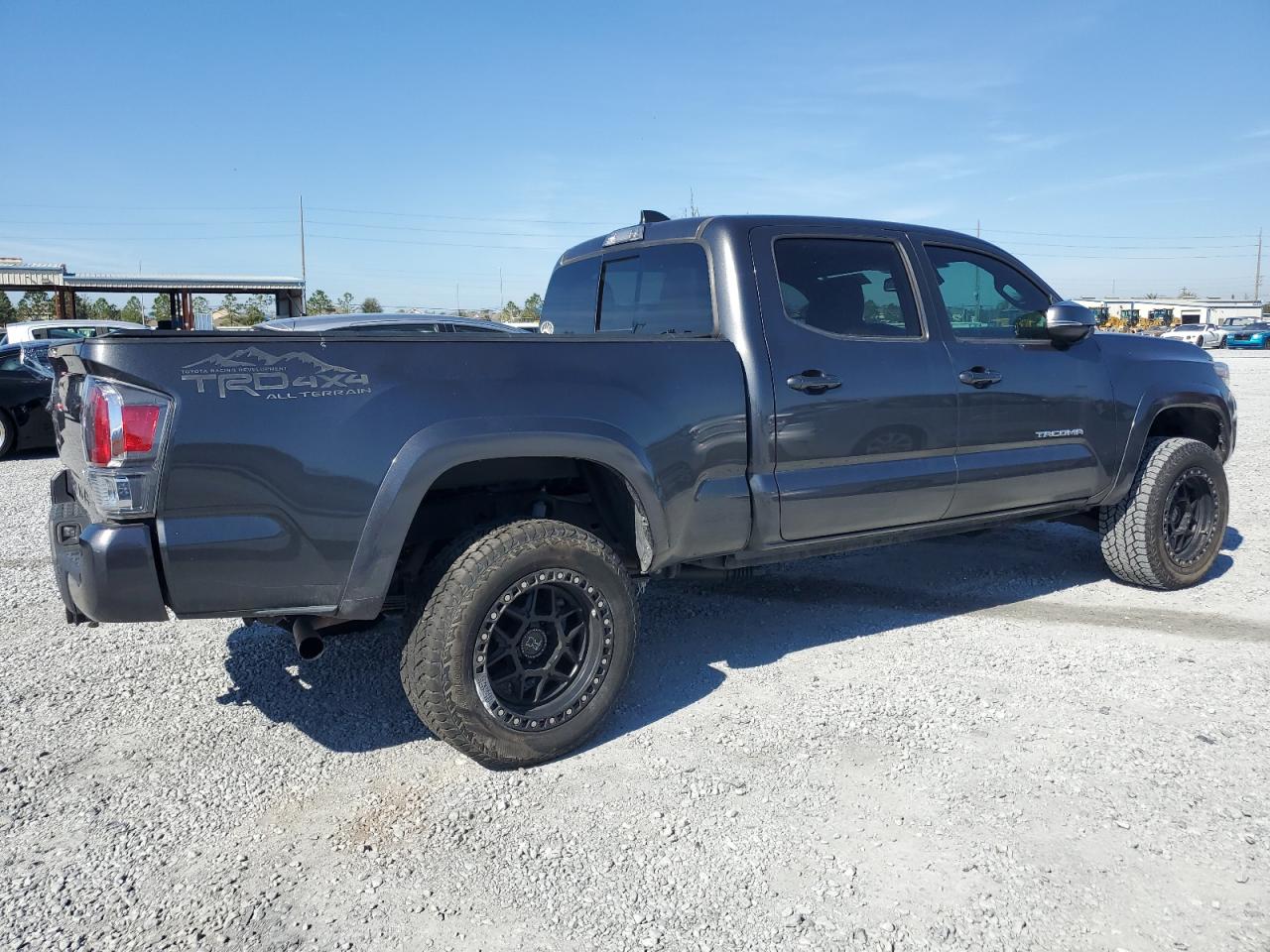 2020 Toyota Tacoma VIN 3TMDZ5BN6LM082962 Copart auction photo, side / rear end damage thumbnail 3