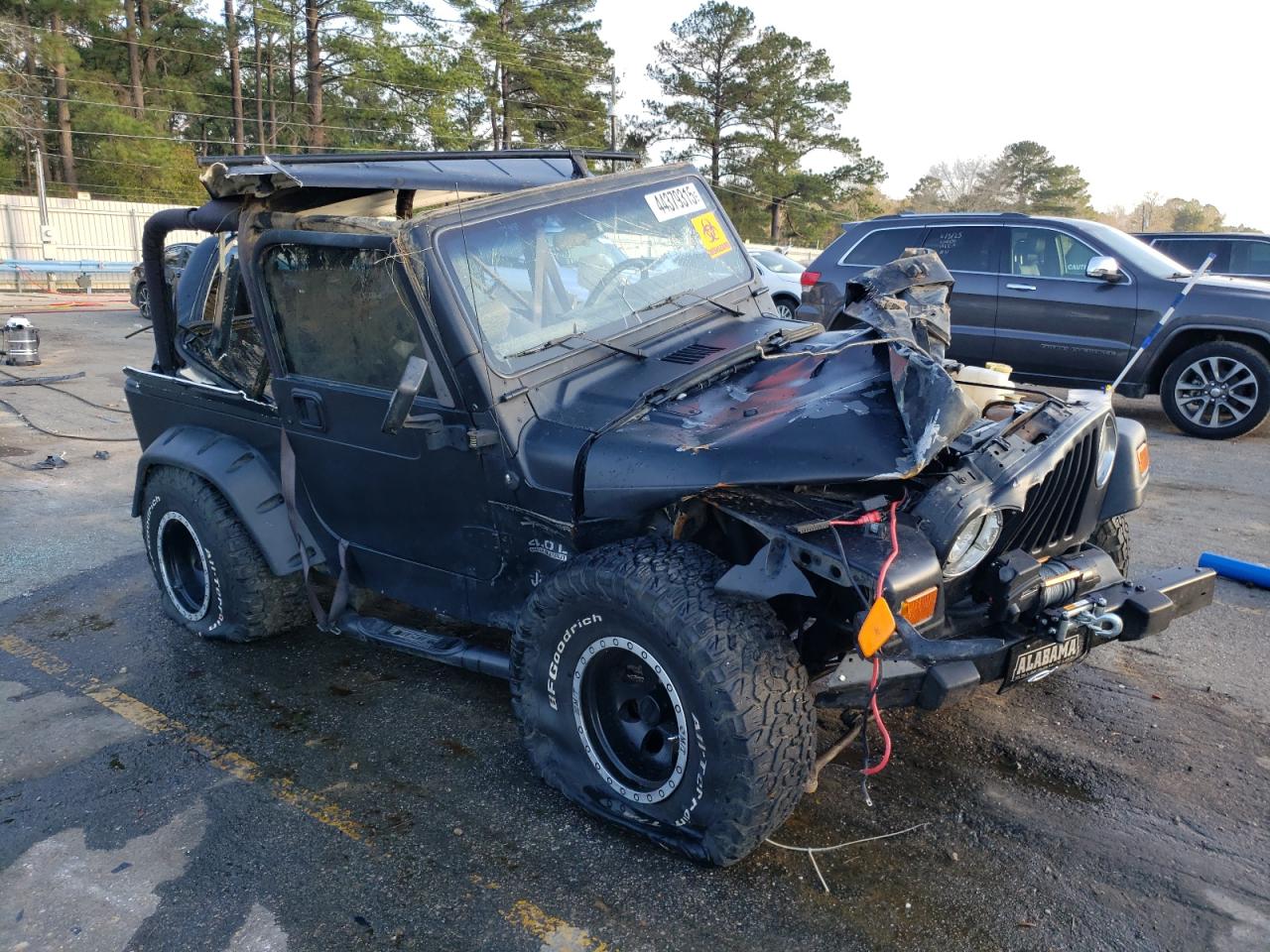 1999 Jeep Wrangler VIN 1J4FY19S5XP463745 Copart auction photo, water/flood / all over damage thumbnail 4