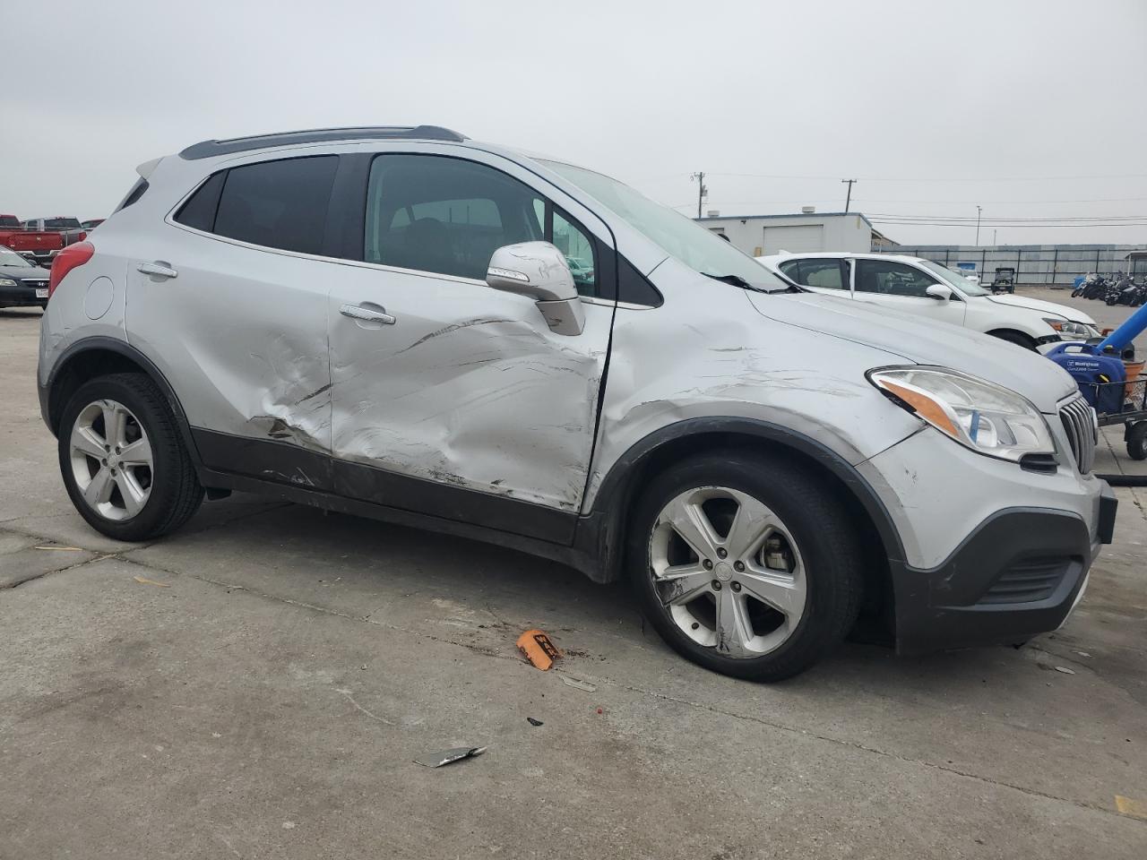 2015 Buick Encore VIN KL4CJASB8FB153577 Copart auction photo, side / front end damage thumbnail 4