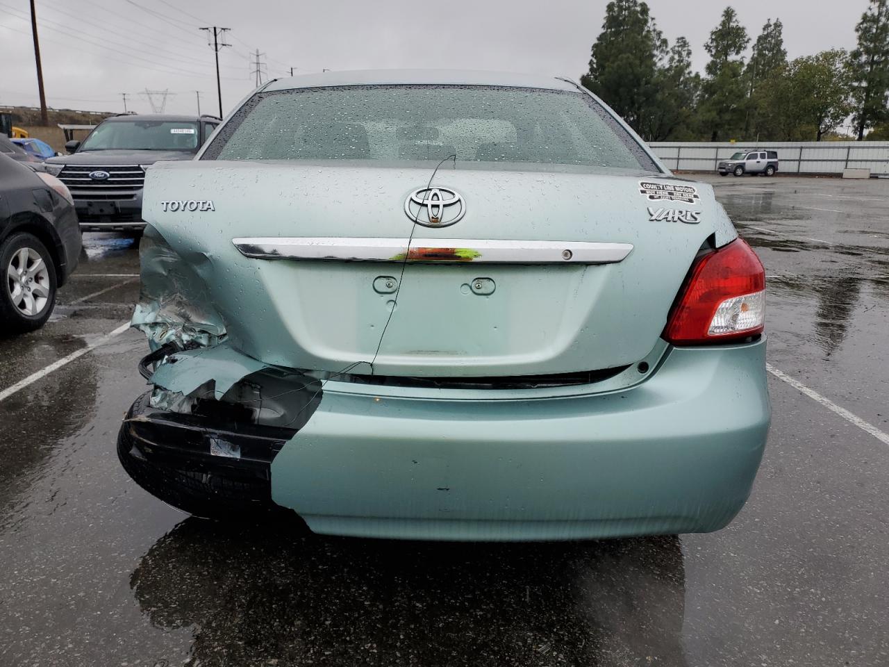 2010 Toyota Yaris VIN JTDBT4K36A1366698 Copart auction photo, rear end damage thumbnail 6
