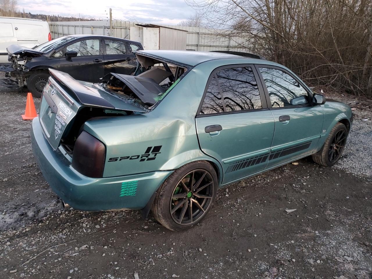 2001 Mazda Protege VIN JM1BJ226510415089 Copart auction photo, side damage thumbnail 3