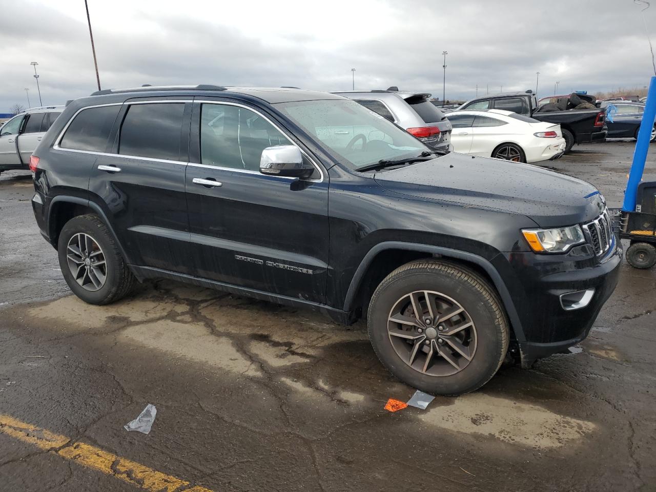 2017 Jeep Grand Cherokee VIN 1C4RJFBG3HC911936 Copart auction photo, side / rear end damage thumbnail 4