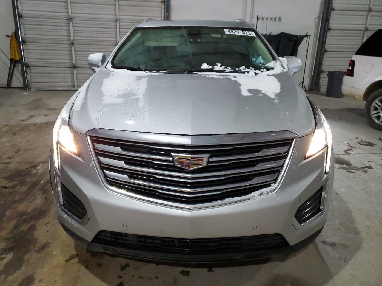 2019 Cadillac XT5 VIN 1GYKNCRS4KZ240984 Copart auction photo, side damage thumbnail 5