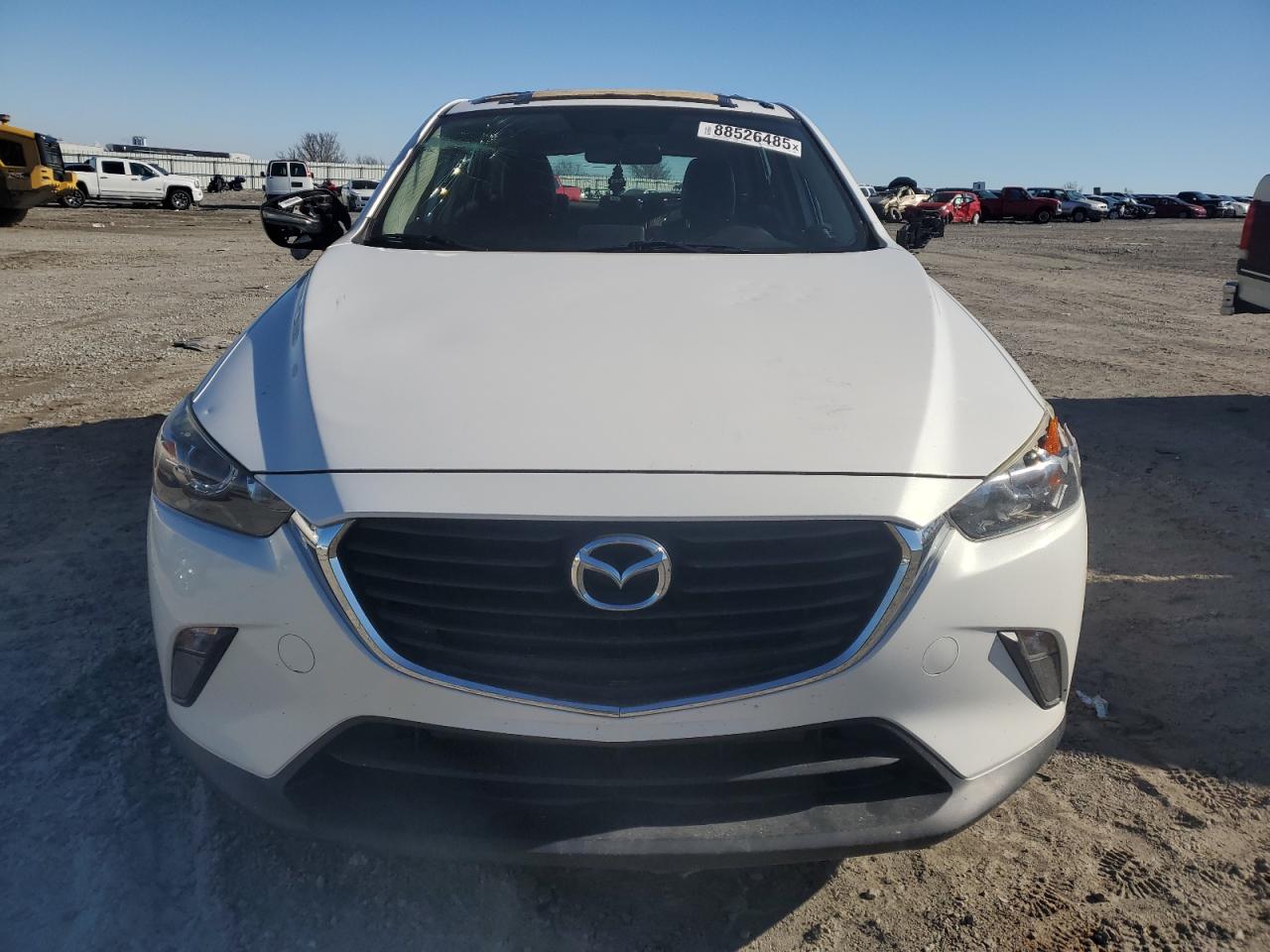 2016 Mazda CX-3 VIN JM1DKBC76G0111498 Copart auction photo, side / front end damage thumbnail 5
