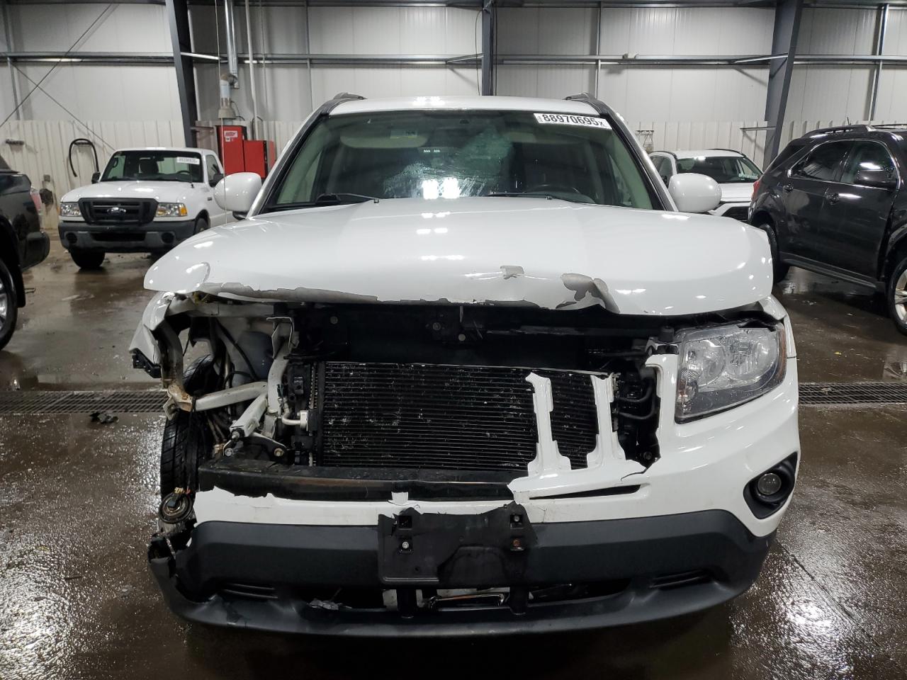 2016 Jeep Compass VIN 1C4NJDEB5GD781380 Copart auction photo, front end / side damage thumbnail 5