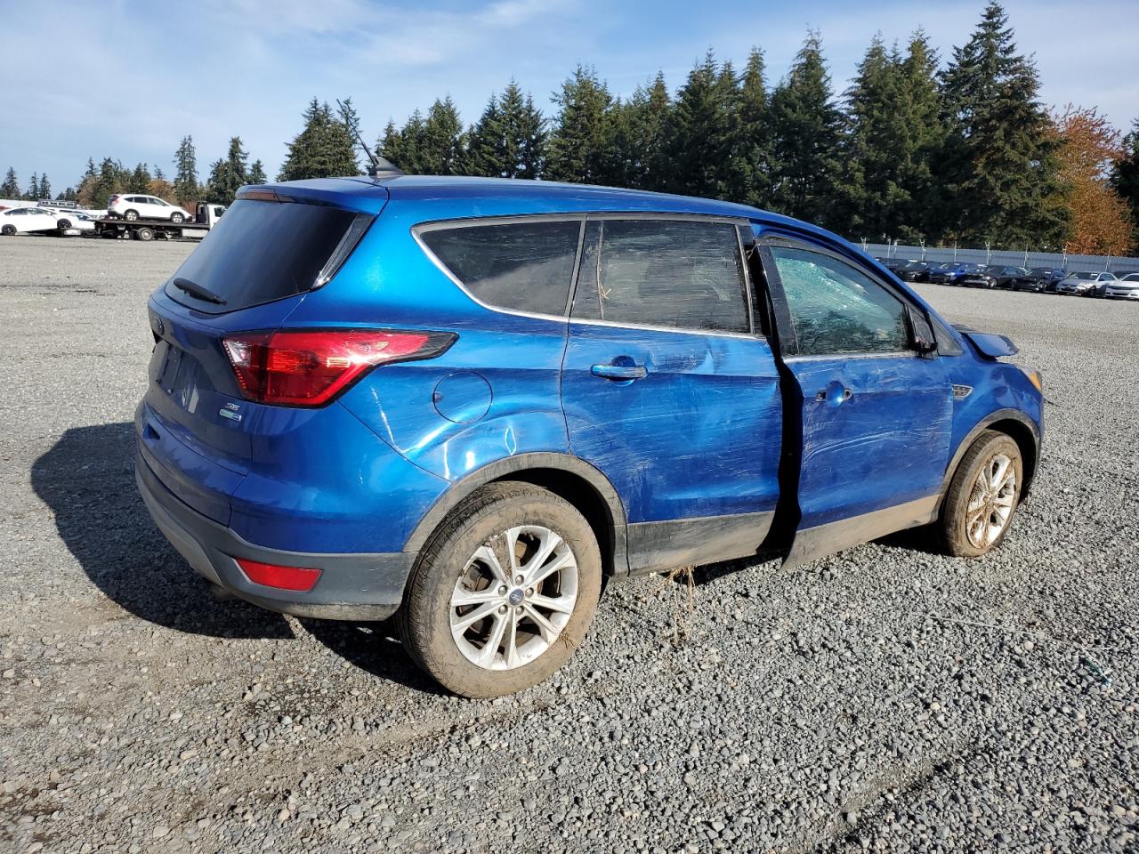 2019 Ford Escape VIN 1FMCU9GDXKUA21184 Copart auction photo, rollover damage thumbnail 3