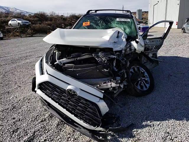 2022 Toyota RAV 4 VIN JTMN1RFVXND087481 Copart auction photo, front end / side damage thumbnail 11