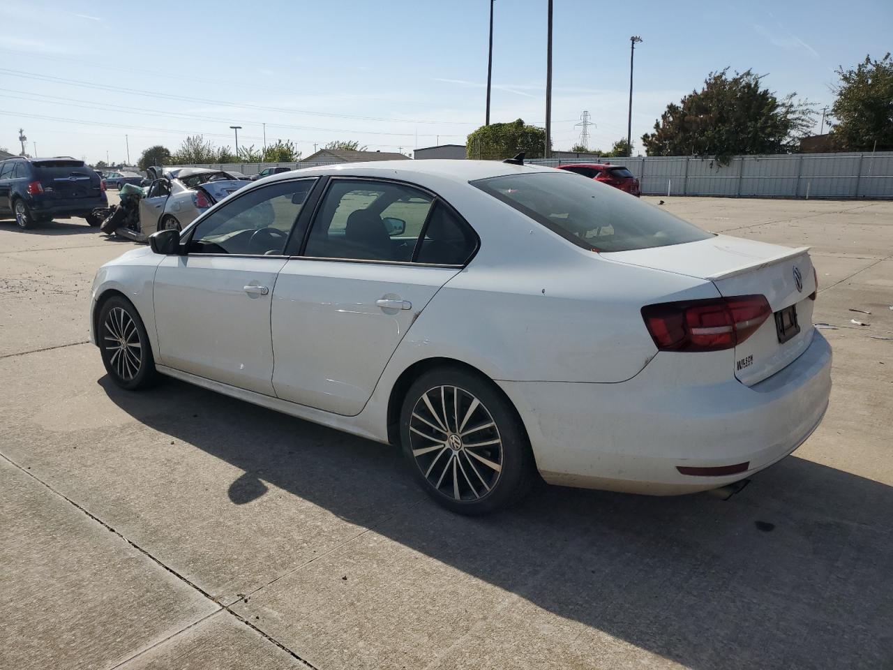 2016 Volkswagen Jetta VIN 3VWD17AJ8GM240559 Copart auction photo, side / minor dent/scratches damage thumbnail 2