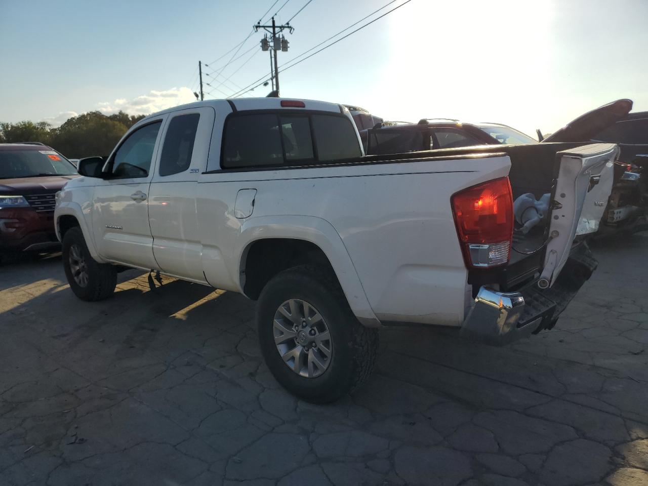 2016 Toyota Tacoma VIN 5TFRZ5CN5GX015077 Copart auction photo, rear end / minor dent/scratches damage thumbnail 2