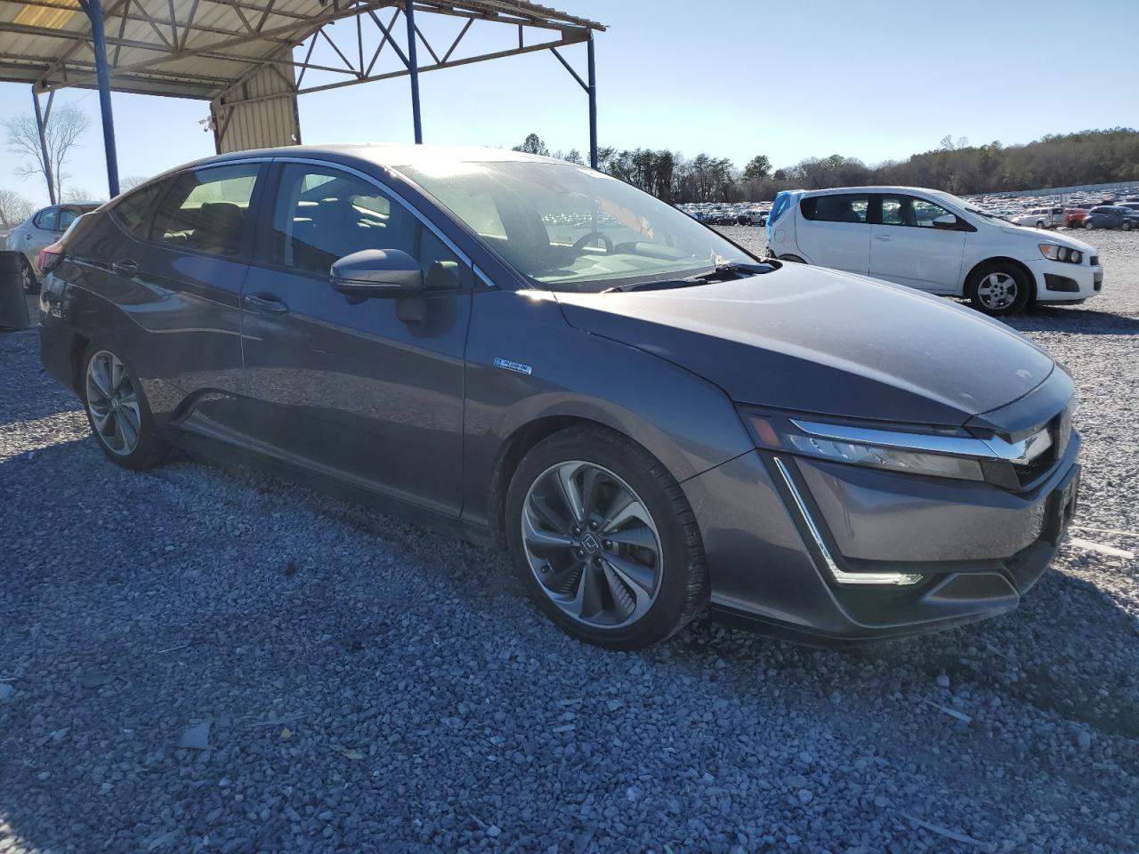 2021 Honda Clarity VIN JHMZC5F35MC000768 Copart auction photo, side damage thumbnail 4