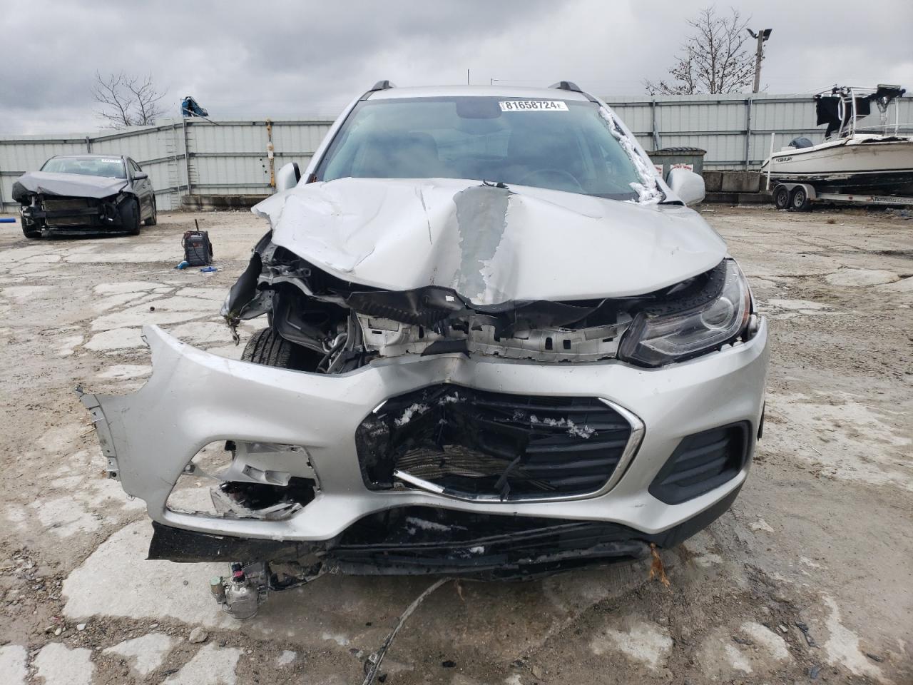 2021 Chevrolet Trax VIN KL7CJPSB7MB324703 Copart auction photo, front end / side damage thumbnail 5