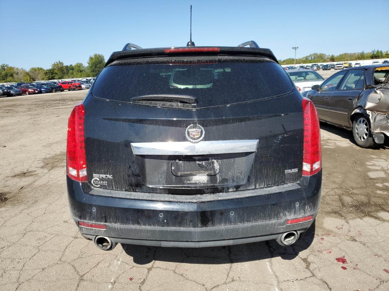 2015 Cadillac SRX VIN 3GYFNBE34FS631114 Copart auction photo, side / front end damage thumbnail 6