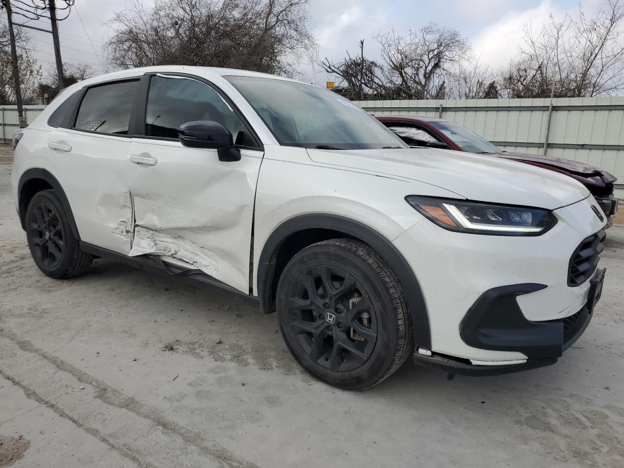 2023 Honda HR-V VIN 3CZRZ1H56PM720651 Copart auction photo, side / minor dent/scratches damage thumbnail 4