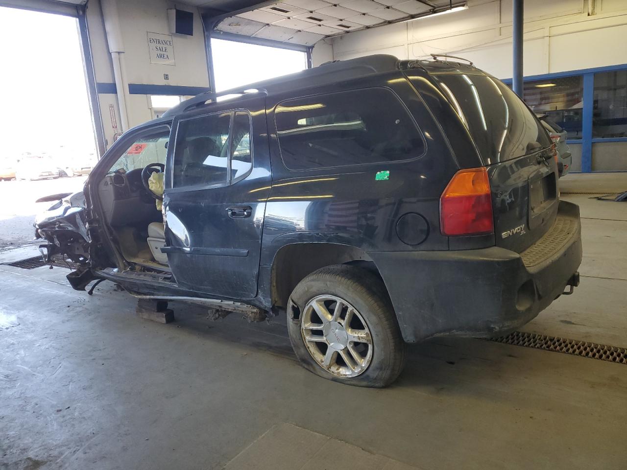 2006 GMC Envoy VIN 1GKET66M766102335 Copart auction photo, front end / side damage thumbnail 2