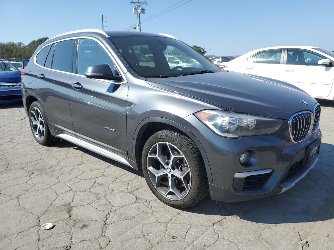 2018 BMW X1 VIN WBXHT3C34J5K30049 Copart auction photo, minor dent/scratches damage thumbnail 4