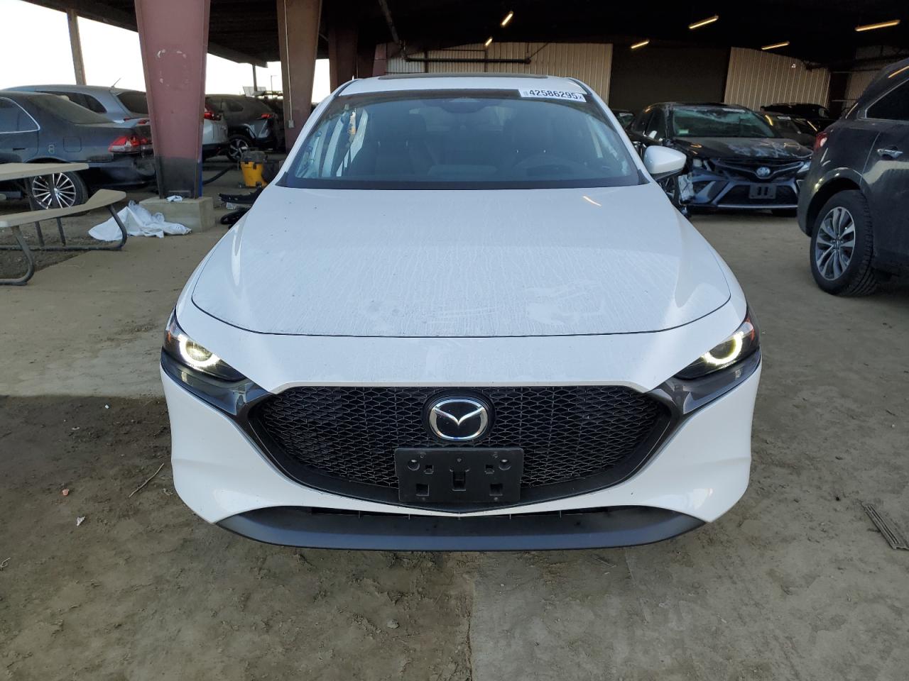 2024 Mazda 3 VIN JM1BPAMMXR1651571 Copart auction photo, stripped damage thumbnail 5