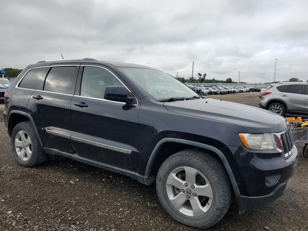 2011 Jeep Grand Cherokee VIN 1J4RR4GG7BC573741 Copart auction photo, side damage thumbnail 4