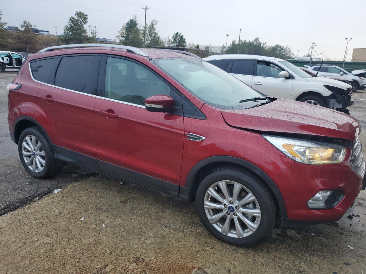 2017 Ford Escape VIN 1FMCU0J92HUB19330 Copart auction photo, minor dent/scratches damage thumbnail 4