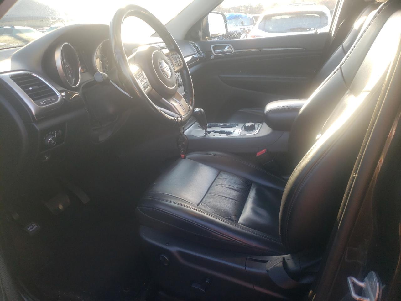 2011 Jeep Grand Cherokee VIN 1J4RR4GT7BC542194 Copart auction photo, side / front end damage thumbnail 7
