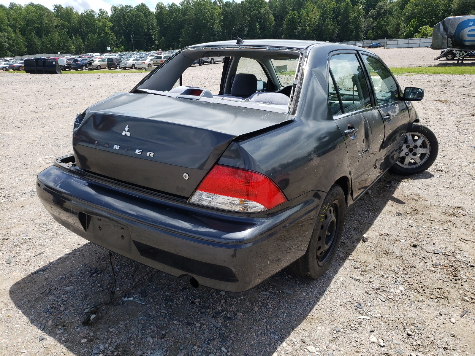 2002 Mitsubishi Lancer VIN JA3AJ36EX2U002399 Copart auction photo, all over / undercarriage damage thumbnail 4