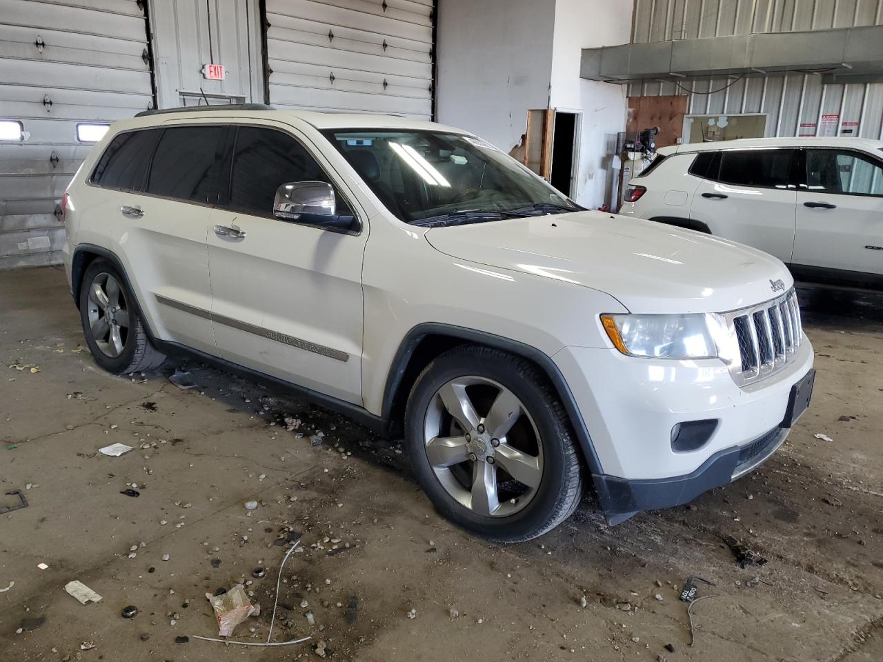2011 Jeep Grand Cherokee VIN 1J4RR6GG7BC672877 Copart auction photo, minor dent/scratches damage thumbnail 4
