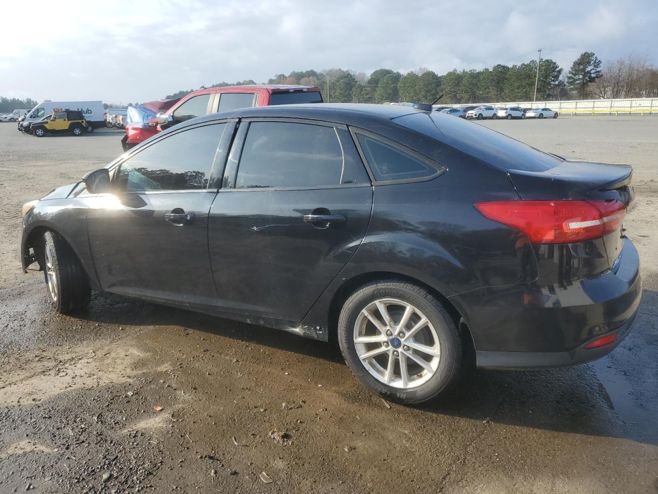 2015 Ford Focus VIN 1FADP3F20FL257194 Copart auction photo, front end / minor dent/scratches damage thumbnail 2