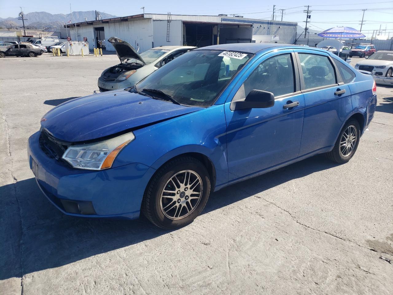 2011 Ford Focus VIN 1FAHP3FN9BW144073 - Copart auction photo
