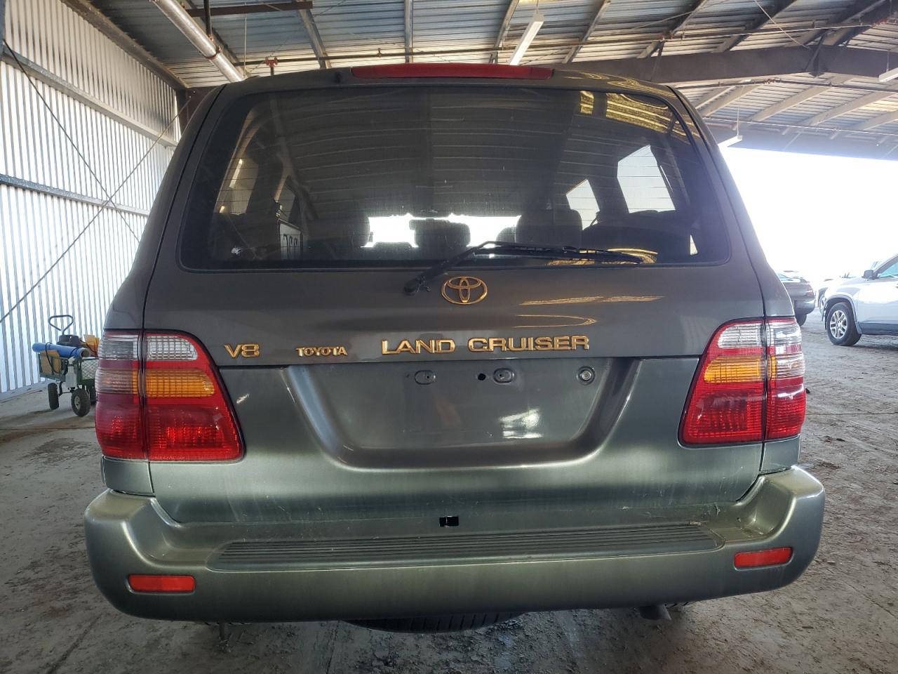 1998 Toyota Land Cruiser VIN JT3HT05J4W0011057 Copart auction photo, side damage thumbnail 6
