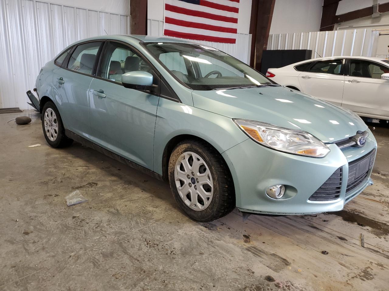 2012 Ford Focus VIN 1FAHP3F27CL353109 Copart auction photo, rear end / front end damage thumbnail 4