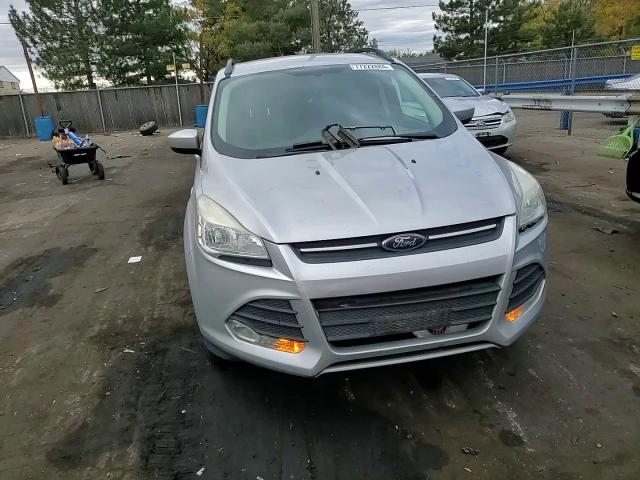 2016 Ford Escape VIN 1FMCU9GX8GUA12825 Copart auction photo, rear end damage thumbnail 10