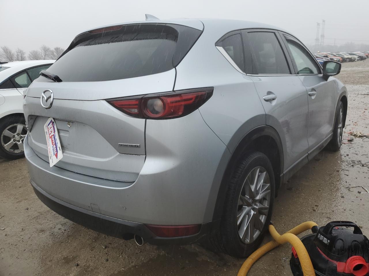 2021 Mazda CX-5 VIN JM3KFBDM4M1374618 Copart auction photo, front end / undercarriage damage thumbnail 3