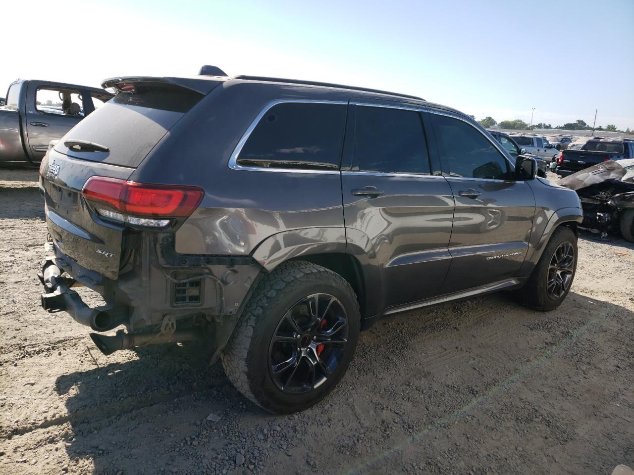 2015 Jeep Grand Cherokee VIN 1C4RJFDJ7FC620006 Copart auction photo, vandalism / stripped damage thumbnail 3