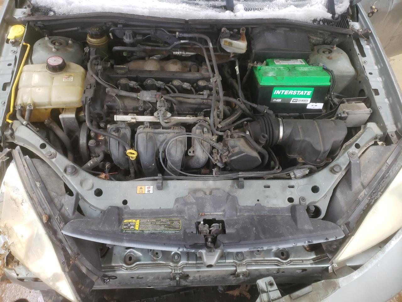 2005 Ford Focus VIN 1FAFP36N65W207075 Copart auction photo, rollover damage thumbnail 13