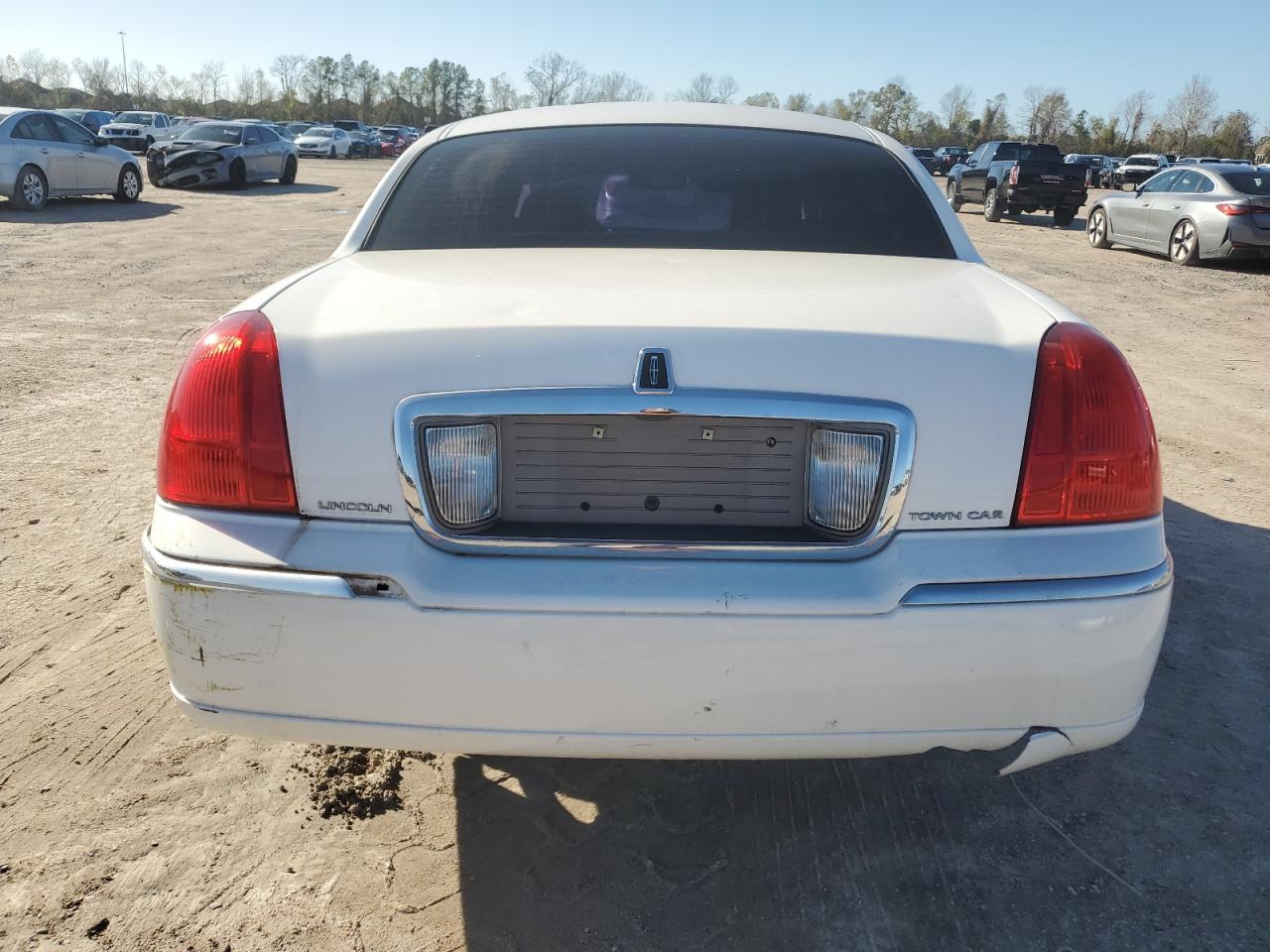 2010 Lincoln Town Car VIN 2LNBL8CV1AX751550 Copart auction photo, all over damage thumbnail 6