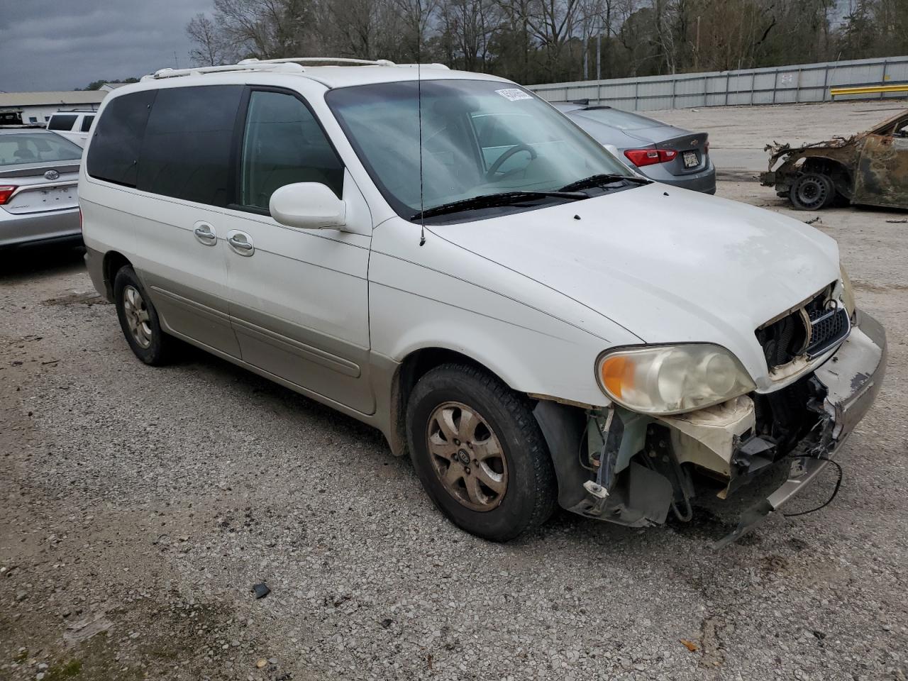2005 KIA Sedona VIN KNDUP132856716570 Copart auction photo, front end damage thumbnail 4
