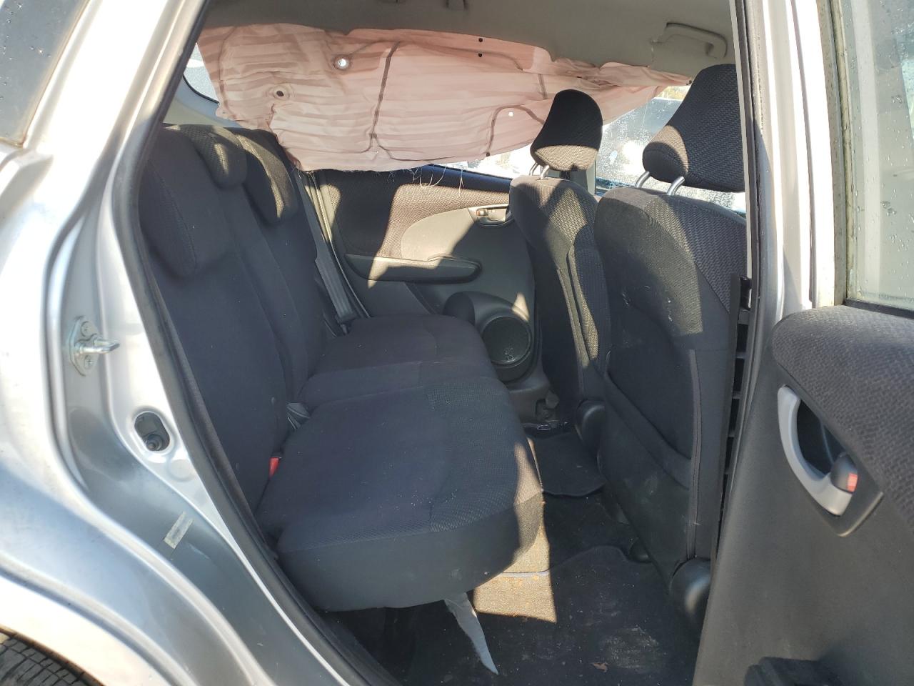 2012 Honda Fit VIN JHMGE8H57CC018379 Copart auction photo, side / front end damage thumbnail 10