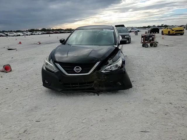 2018 Nissan Altima VIN 1N4AL3AP3JC129719 Copart auction photo, front end / minor dent/scratches damage thumbnail 11