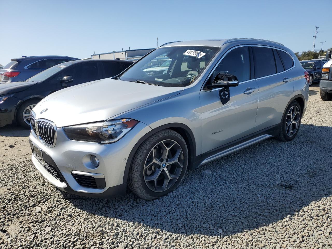 2016 BMW X1 VIN WBXHT3C35G5E51218 - Copart auction photo