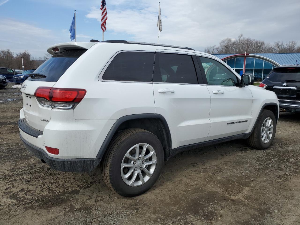 2021 Jeep Grand Cherokee VIN 1C4RJFAG5MC545909 Copart auction photo, side damage thumbnail 3