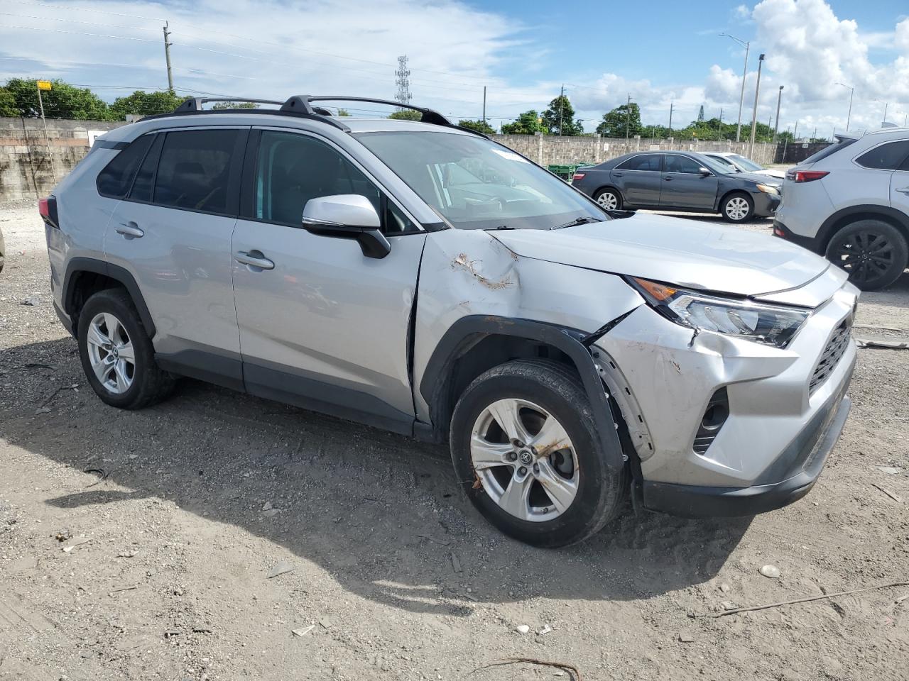 2019 Toyota RAV 4 VIN 2T3W1RFV5KW050177 Copart auction photo, all over damage thumbnail 4