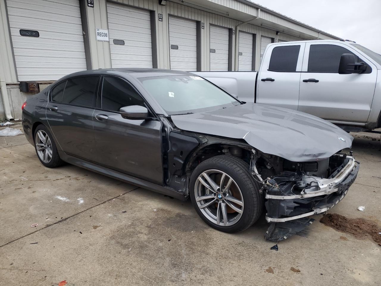 2016 BMW 7er VIN WBA7F2C57GG420658 Copart auction photo, front end / minor dent/scratches damage thumbnail 4