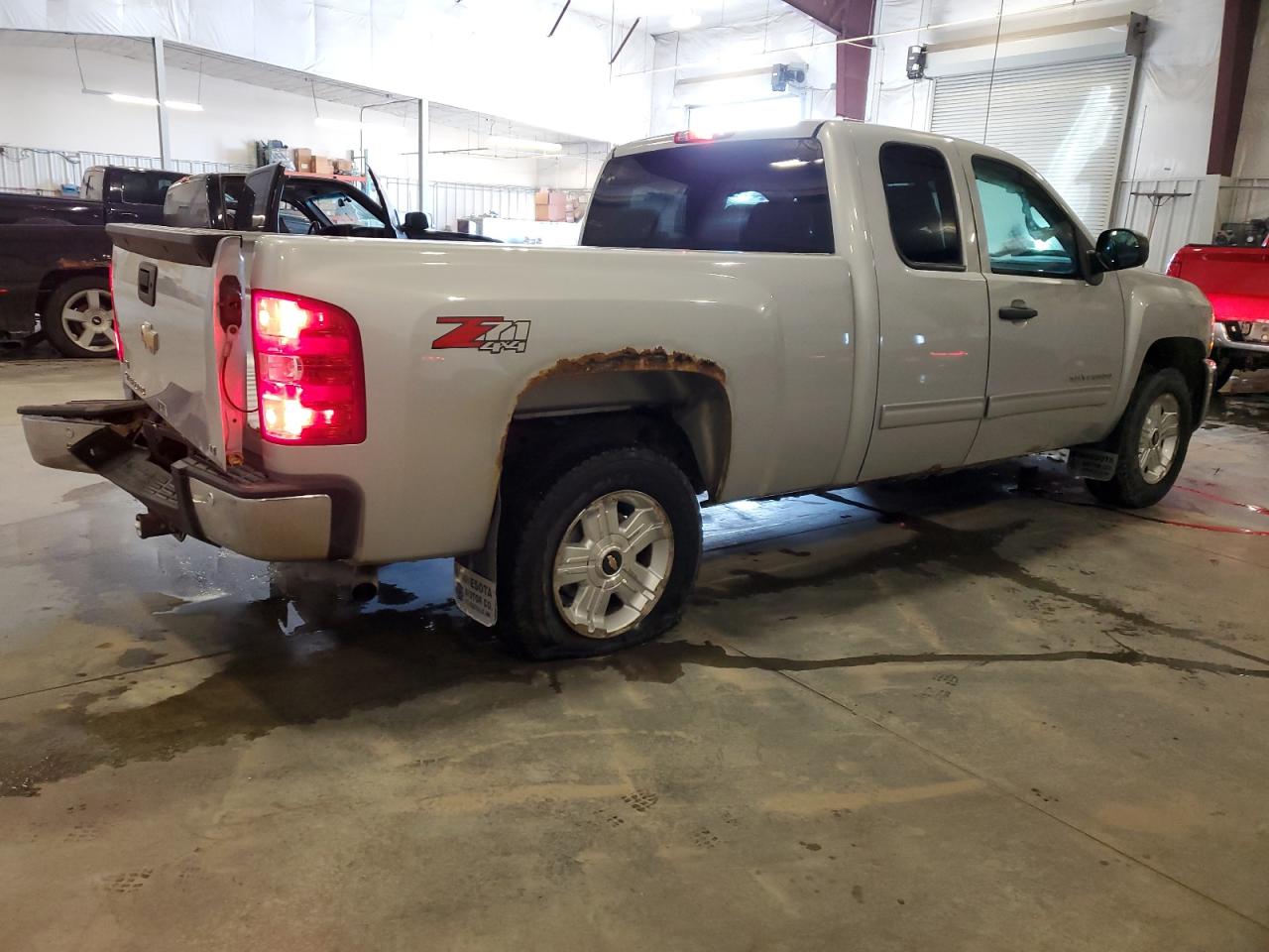 2012 Chevrolet Silverado VIN 1GCRKSE79CZ181618 Copart auction photo, side / rear end damage thumbnail 3